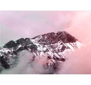 Snowy mountain peak fototapeta z gorami - TenStickers