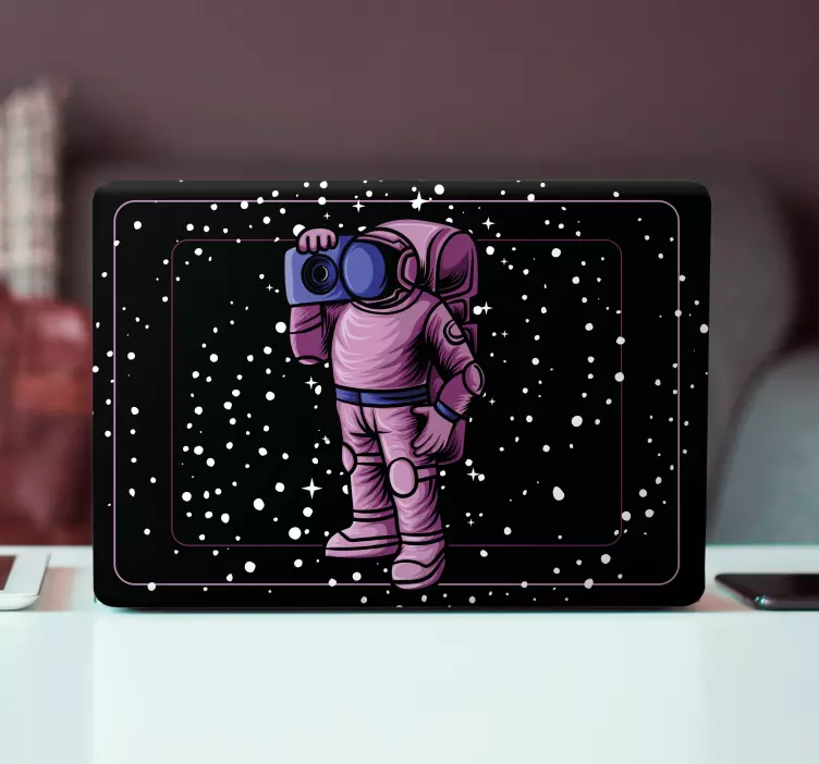 Astronaut z kamero nalepka za prenosni računalnik - TenStickers